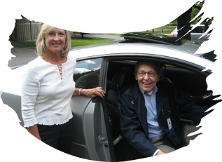 Woman Standing with Man in Car